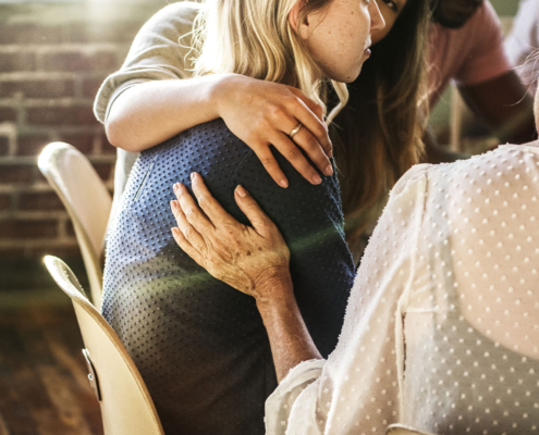 close friends and family members staging an addiction intervention