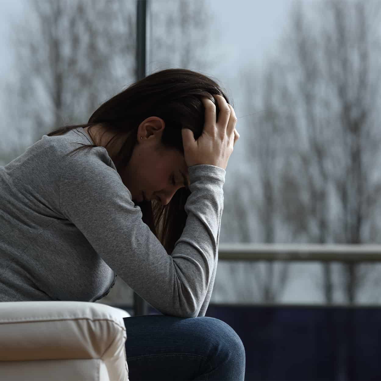 woman struggling with addiction recovery process