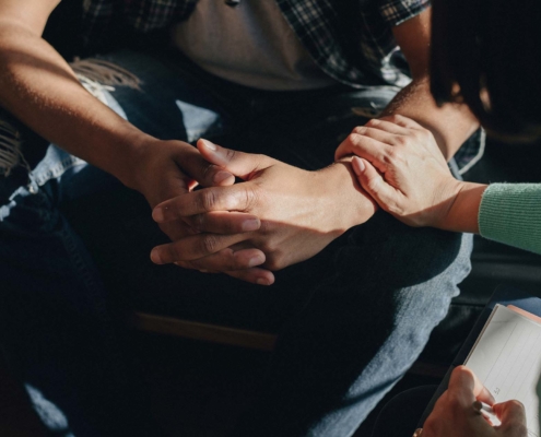 People support each other in a rehab session