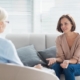 Picture of a woman at home talking to a counselor