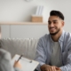 Young man sitting on a couch in a specialist's office