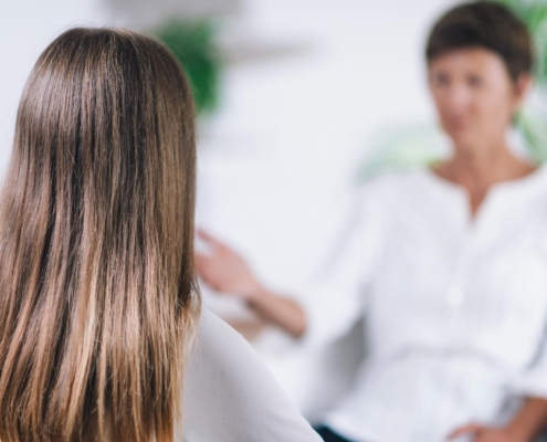 Back view of a woman in therapy