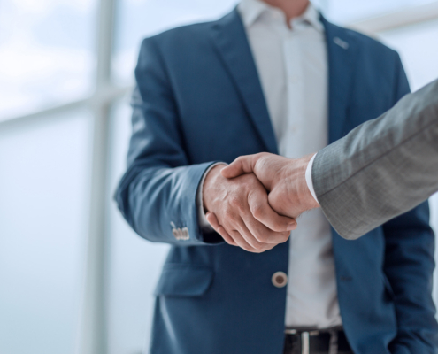 business partners shaking hands . concept of partnership