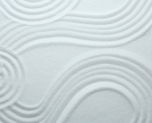 White sand with pattern as background, top view. Zen, meditation