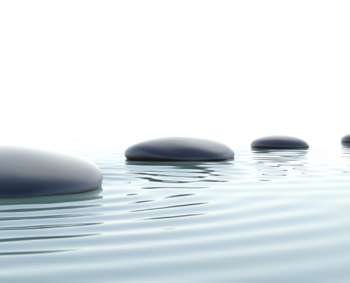 Smooth rocks laid on water